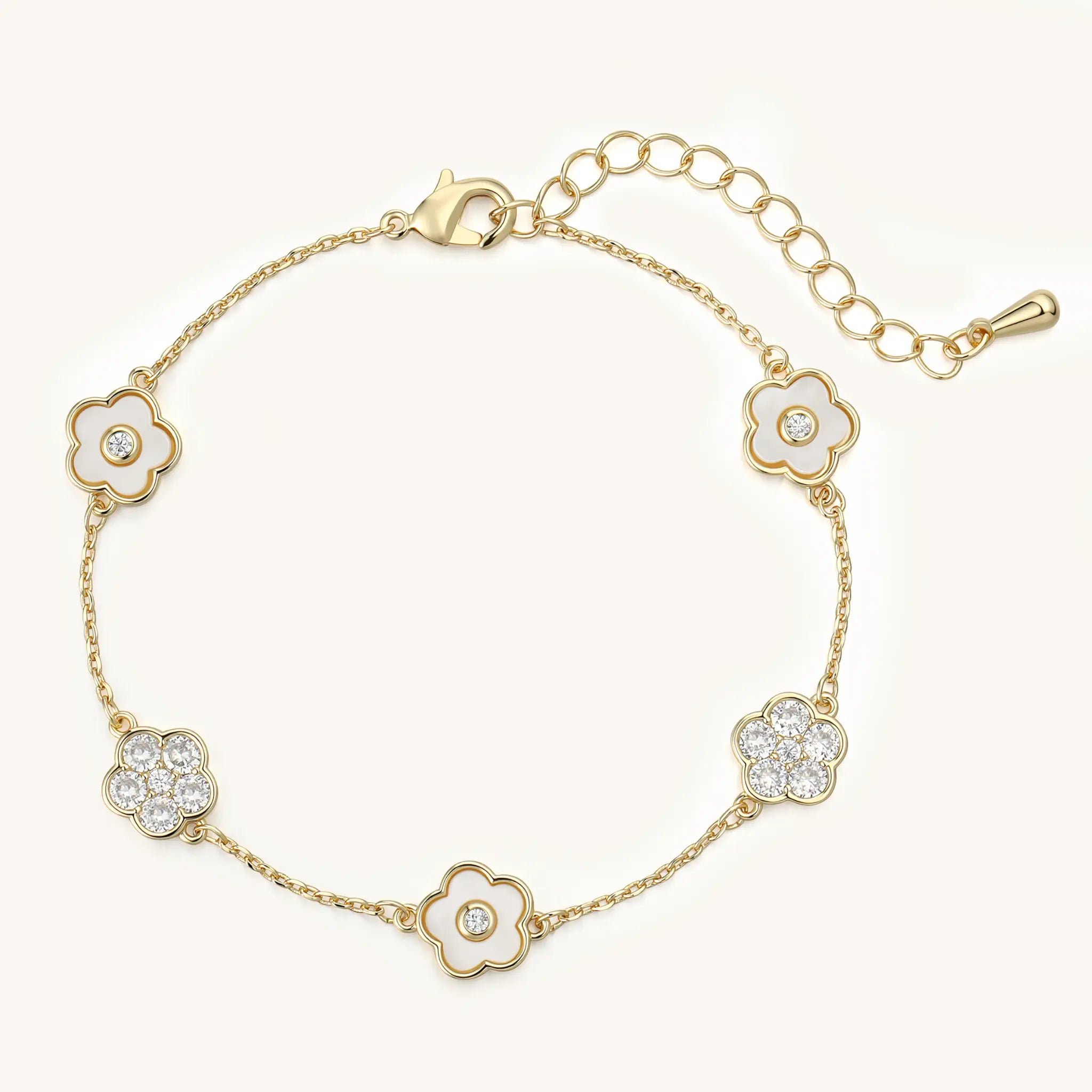 Top view of Vilrian adjustable gold floral bracelet with lobster clasp and extension chain