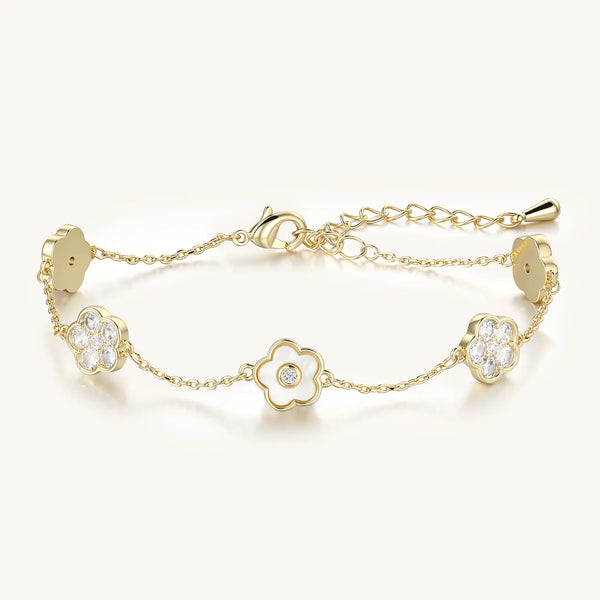 Vilrian gold floral charm bracelet with mother of pearl and cubic zirconia flowers