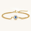 Vilrian gold plated stainless steel curb chain bracelet with round sapphire blue halo zirconia